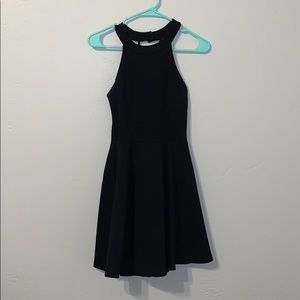 Medium open back, halter black dress